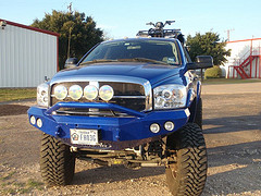 Front view of a blue ATV