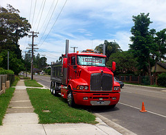 Red and silver dump truck